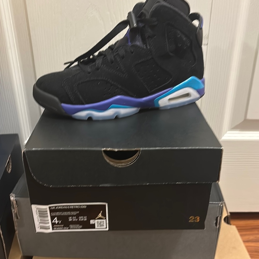 Air Jordan Black Sneakers with Blue and Purple Accents